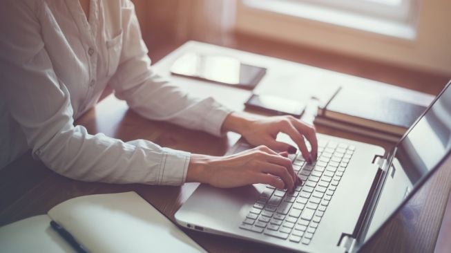 mengatur alignment teks di Word